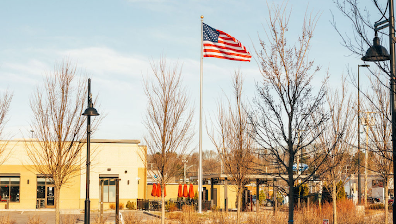 Rock Row Campus Exterior Of Chick Fil A And Flag Pole